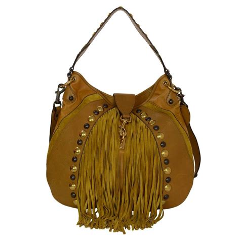 tan suede gucci hobo bag with fringe rivets|Gucci shopping bags.